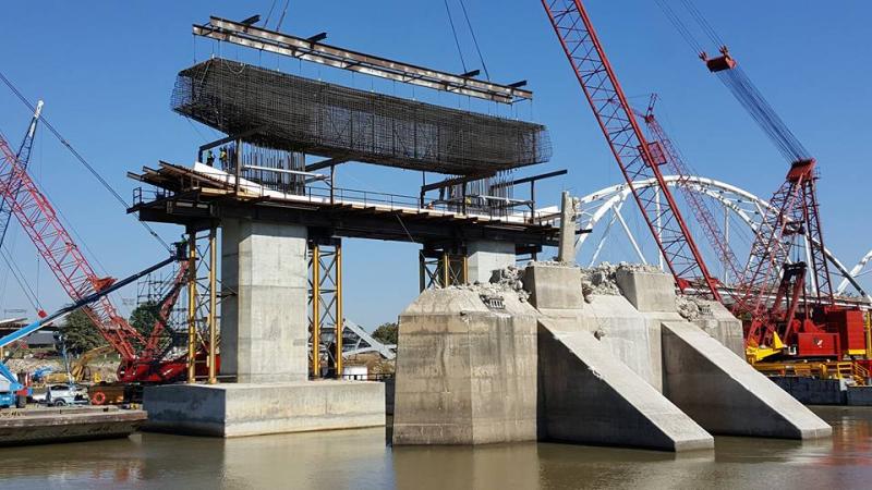 Little Rock's Broadway Bridge simultaneously being destroyed and reconstructed